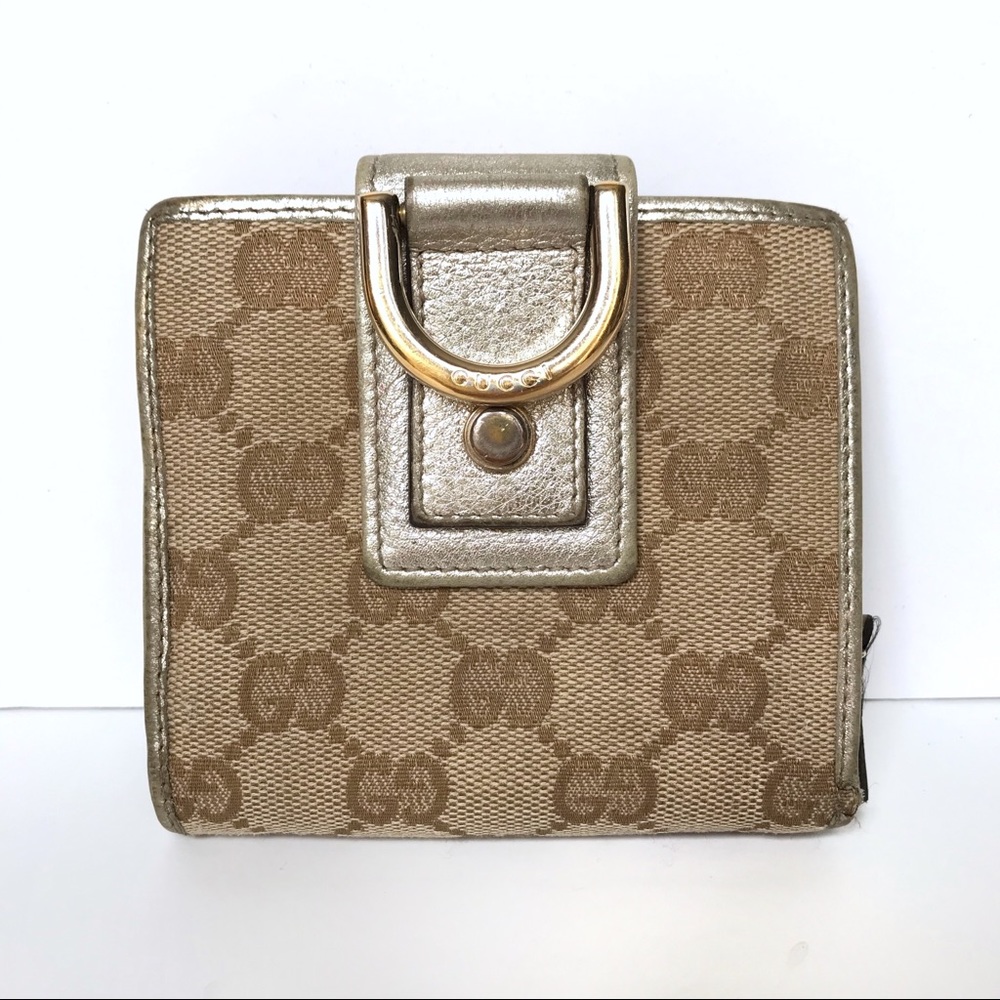 GUCCI • gold monogram wallet